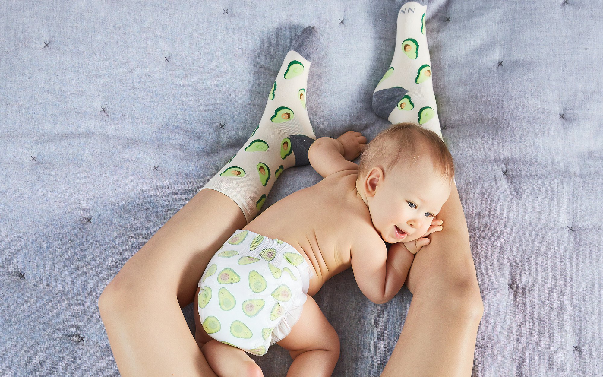 https://www.onemedical.com/media/images/Baby_playing_on_moms_legs.original.jpg